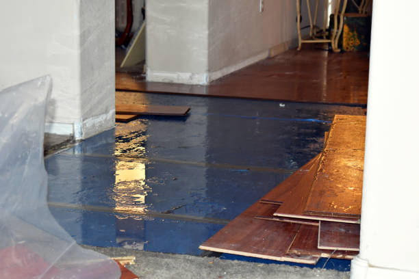 Professional Emergency Water Damage Restoration technician working in Richmond Hill, NY